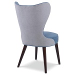 The Maribella Chair in Celbes Velvet with Cannon Grey Velvet back sits in a studio.