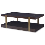 The Mercer Coffee Table in Warm Dark Oak with Finished Aged Brass sits in a studio.