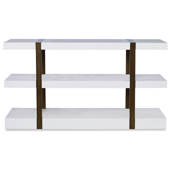 The Mercer Console in Smooth White Gesso with Finished Aged Brass sits in a studio.