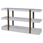 The Mercer Console in Smooth White Gesso with Finished Aged Brass sits in a studio.