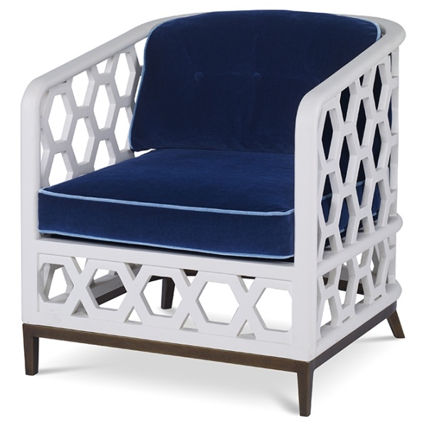 The Wilhelm Chair in Santorini White and Lapis Blue Velvet sits in a studio